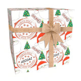 A gift box with a burlap bow tied around it, decorated with Christmas trees and Santa Claus. The box has a repeating pattern of Christmas-themed elements, including a North Pole, Santa Claus, and a Santa hat.