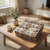 a wooden coffee table with a square gift box on top, which has a collage of photos and a note attached to it. The table is set in a living room with a potted plant, a vase, and a pair of scissors.