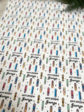 a repeating pattern of colorful skateboards and the name "George" written on them.