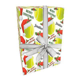 A gift box wrapped in a Christmas-themed paper with tennis balls and a Santa hat.