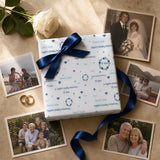 a gift box with a blue ribbon, surrounded by various photographs, including a couple's wedding anniversary photos and a family portrait.
