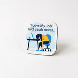 A person is sitting at a desk with a laptop, appearing tired or overwhelmed, and the text above the image says "I Love My Job' said Sarah never."