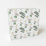A square-shaped gift box with a repeating pattern of gray ducks wearing green boots and the text "Happy Birthday Janet" printed on it.