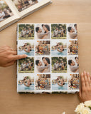 A person is holding a wrapped gift box with a collage of photos of people, including a father and his children, on it.
