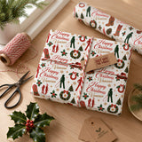 a festive scene with Christmas-themed wrapping paper, a pair of scissors, a holly leaf, and a hot dog. The wrapping paper has a repeating pattern of Christmas trees, Santa Claus, and other holiday symbols.