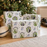three wrapped rugby-themed gift boxes with the name "Jack" printed on them, placed on a wooden floor in front of a Christmas tree.